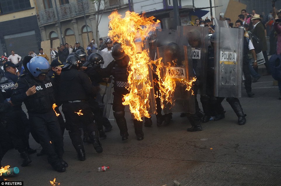 2918e67d00000578 3098775 violence protesters threw molotov cocktails at police eight mont a 24 1432715462705